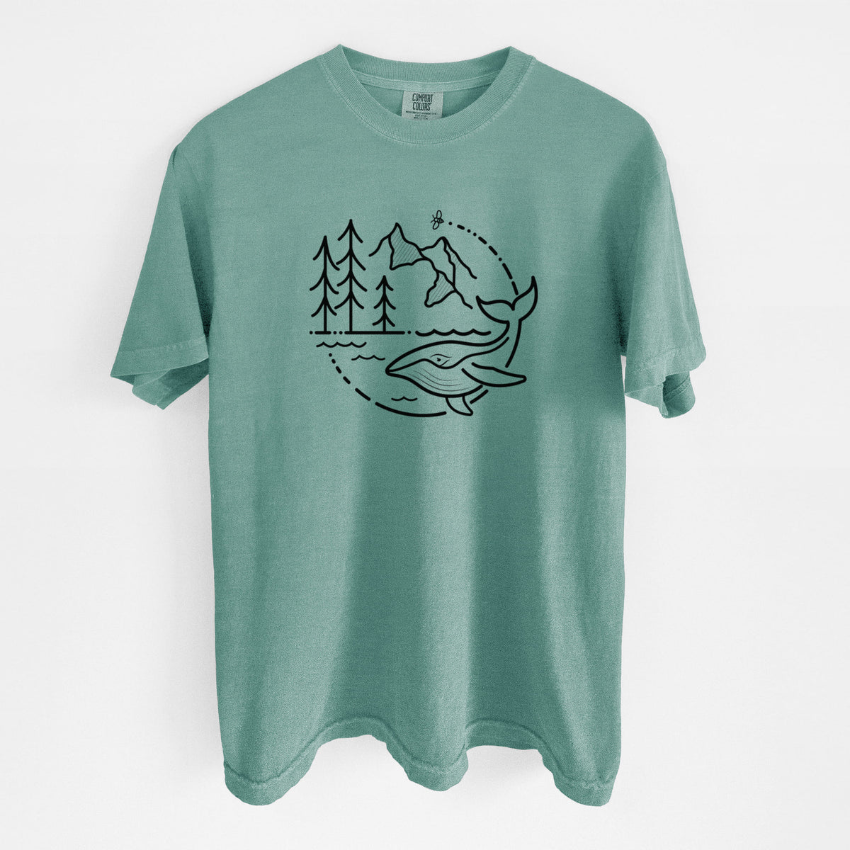 Reef green Comfort Colors t-shirt laid flat, printed with a black line art circle connecting a mountain range, pine trees, a bee and a whale swimming in ocean waves.