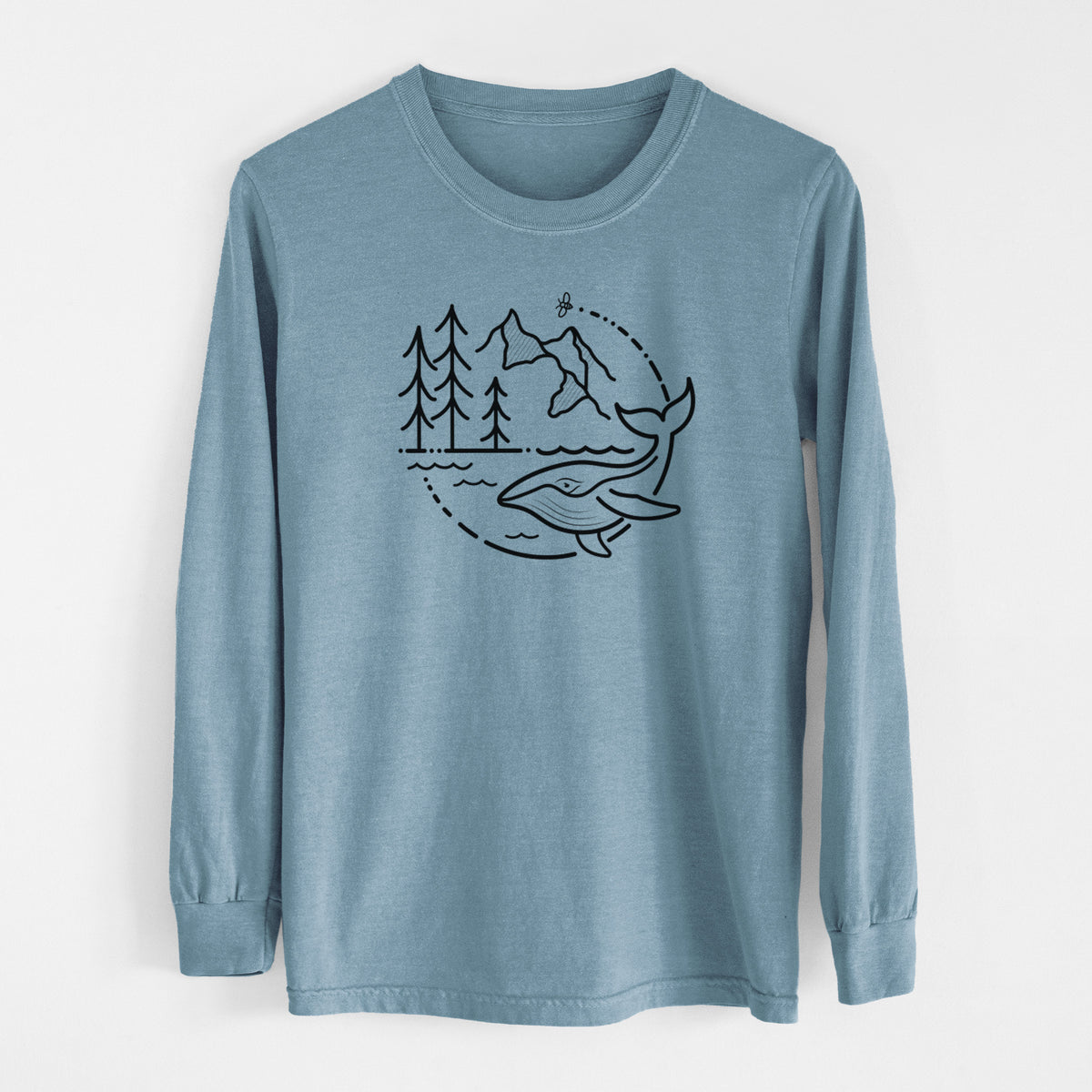 Steel blue Comfort Colors long sleeve shirt laid flat, printed with a black line art circle connecting a mountain range, pine trees, a bee and a whale swimming in ocean waves.