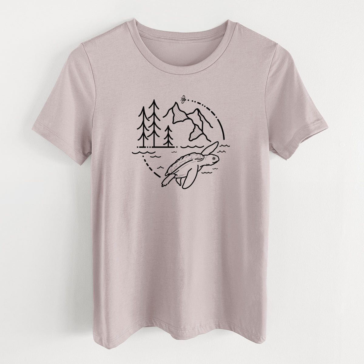 Pink gravel women's relaxed fit cotton t-shirt laid flat, printed with a black line art circle connecting pine trees, mountains, a bee and a Kemp's ridley sea turtle swimming.