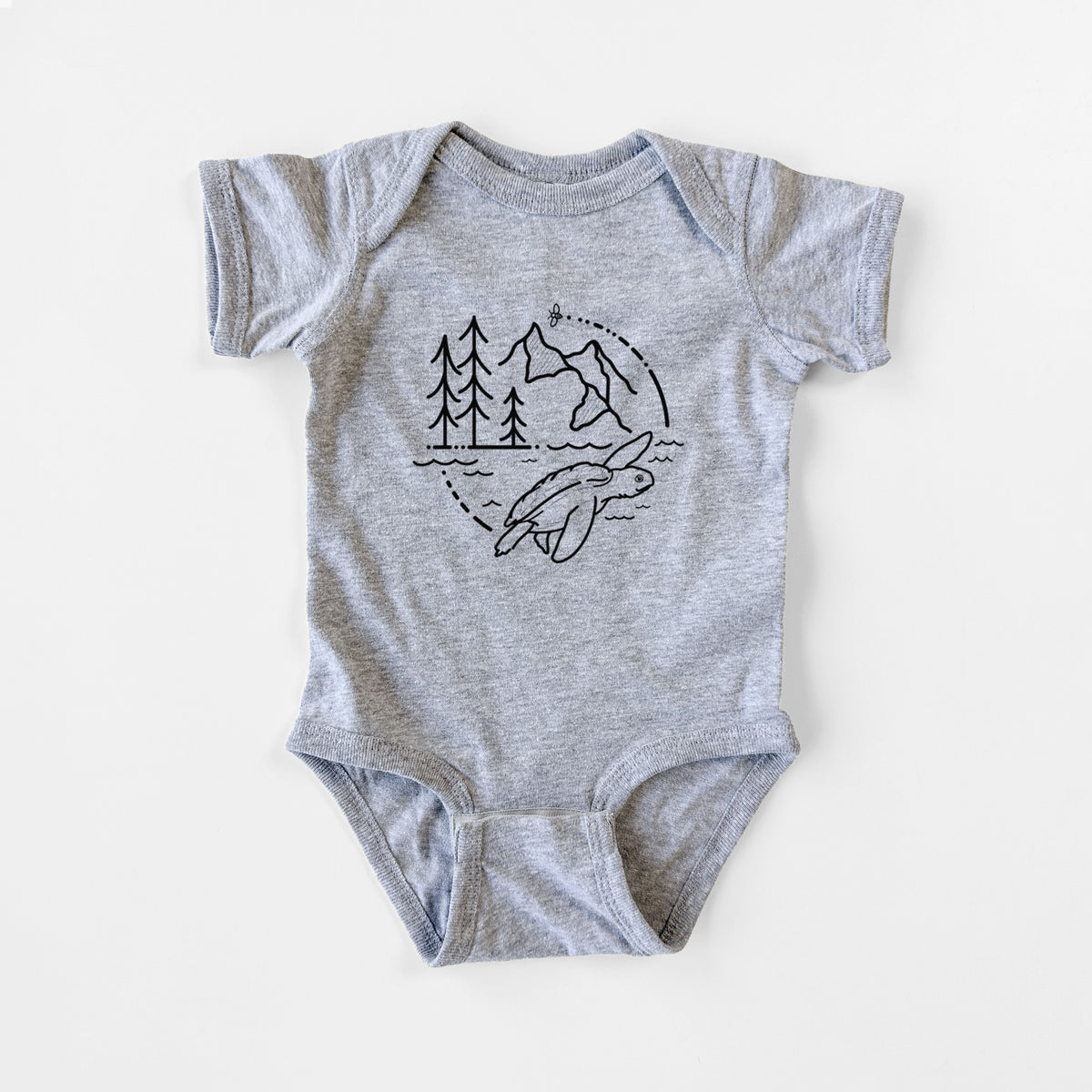 Grey baby bodysuit laid flat, printed with a black line art circle connecting pine trees, mountains, a bee and a Kemp's ridley sea turtle swimming.