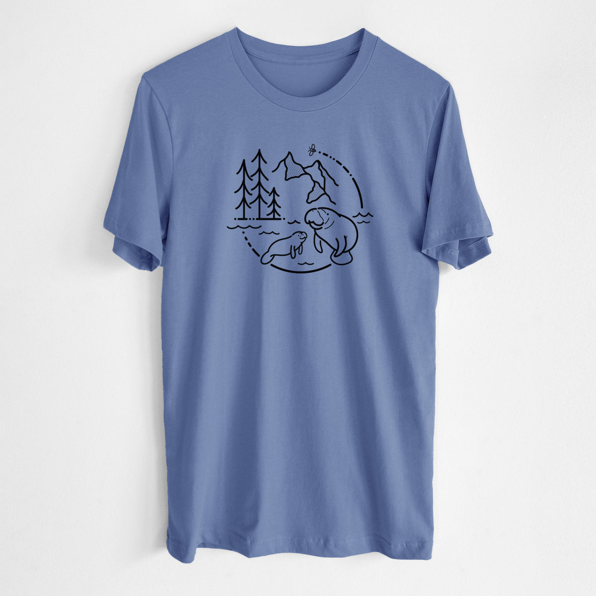 Blue bell lightweight cotton t-shirt laid flat, printed with a black line art circle connecting pine trees, mountains, a bee and two manatees swimming in water.