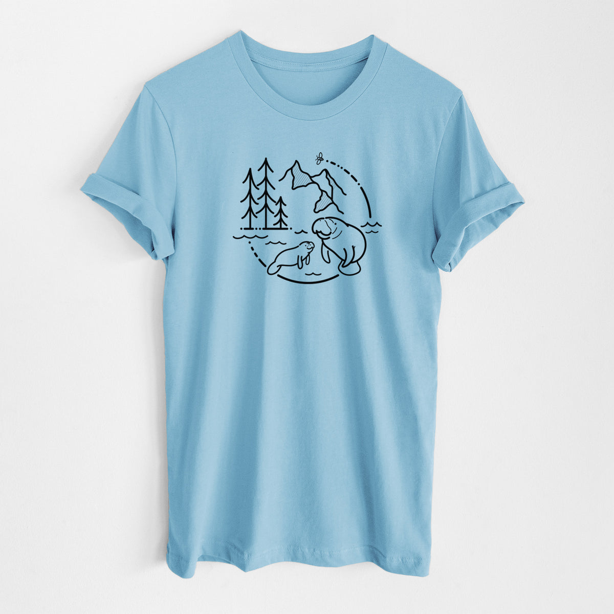 Ocean blue lightweight cotton t-shirt laid flat, printed with a black line art circle connecting pine trees, mountains, a bee and two manatees swimming in water.