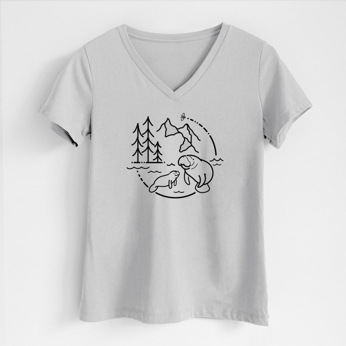 Lunar grey women's relaxed fit cotton V-neck t-shirt laid flat, printed with a black line art circle connecting pine trees, mountains, a bee and two manatees swimming in water.