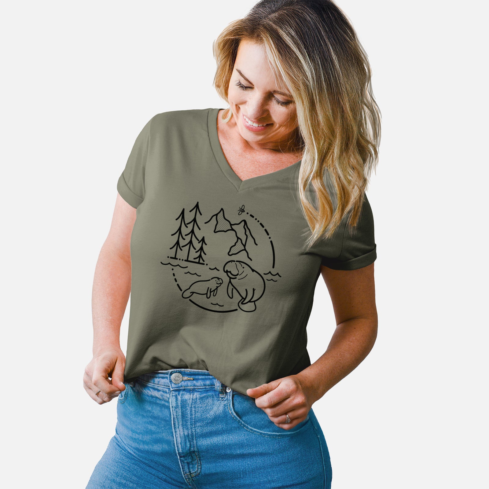 Turquoise women's relaxed fit cotton V-neck t-shirt laid flat, printed with a black line art circle connecting pine trees, mountains, a bee and two manatees swimming in water.