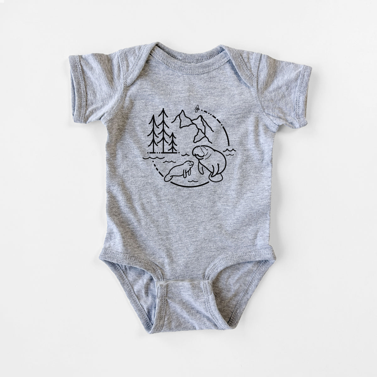 Grey baby bodysuit laid flat, printed with a black line art circle connecting pine trees, mountains, a bee and two manatees swimming in water.