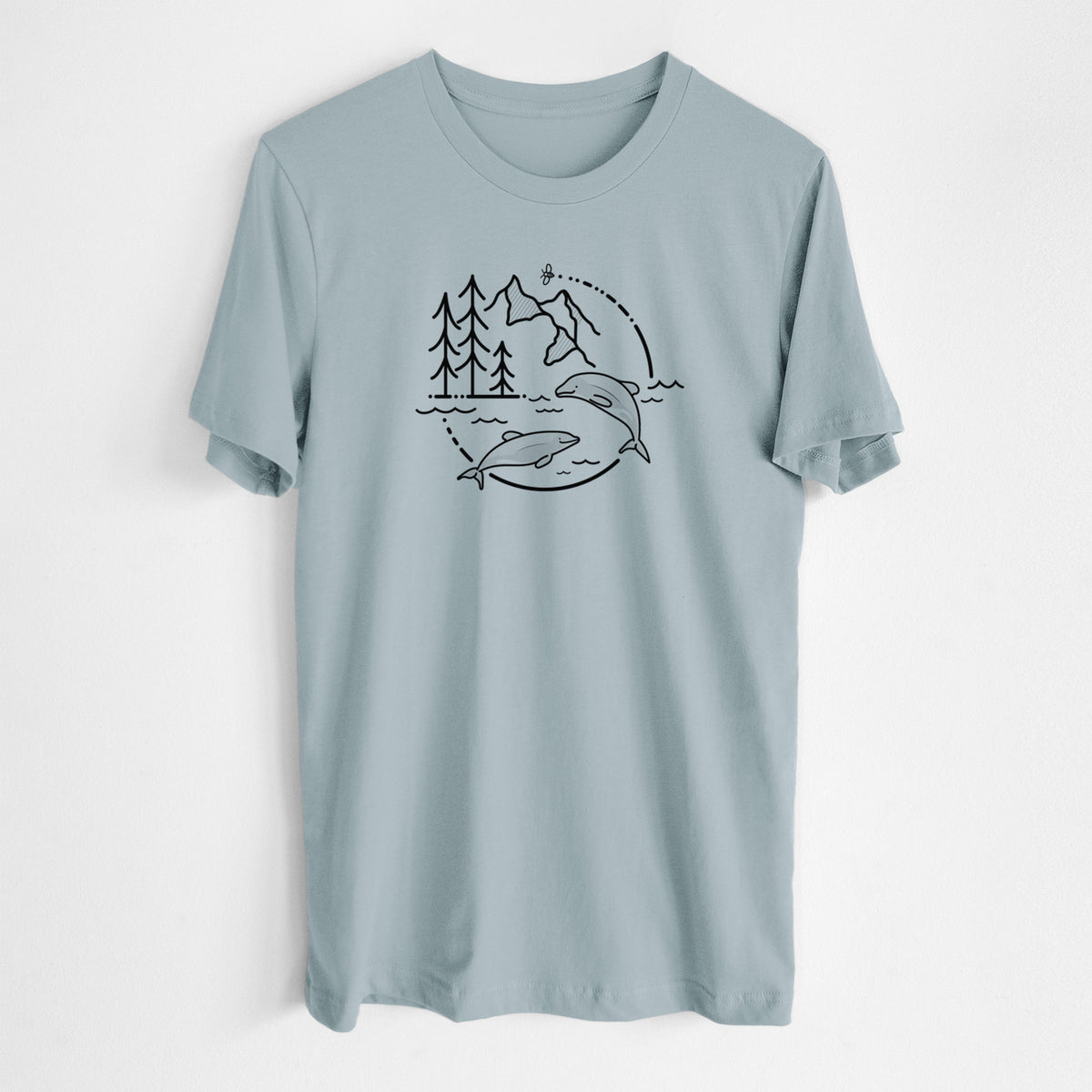 Vintage denim lightweight cotton t-shirt laid flat, printed with a black line art circle connecting pine trees, mountains, a bee and two Maui dolphins leaping from the waves.