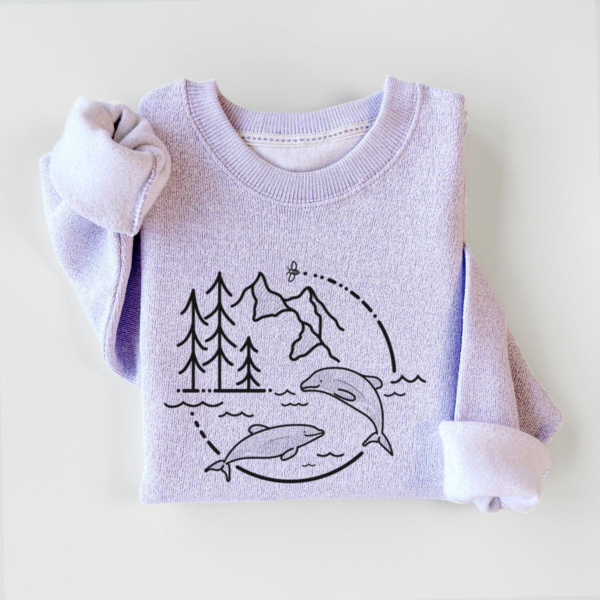 Ice purple knit sweatshirt printed with a black line art circle connecting pine trees, mountains, a bee and two Maui dolphins leaping from the waves, styled flat.