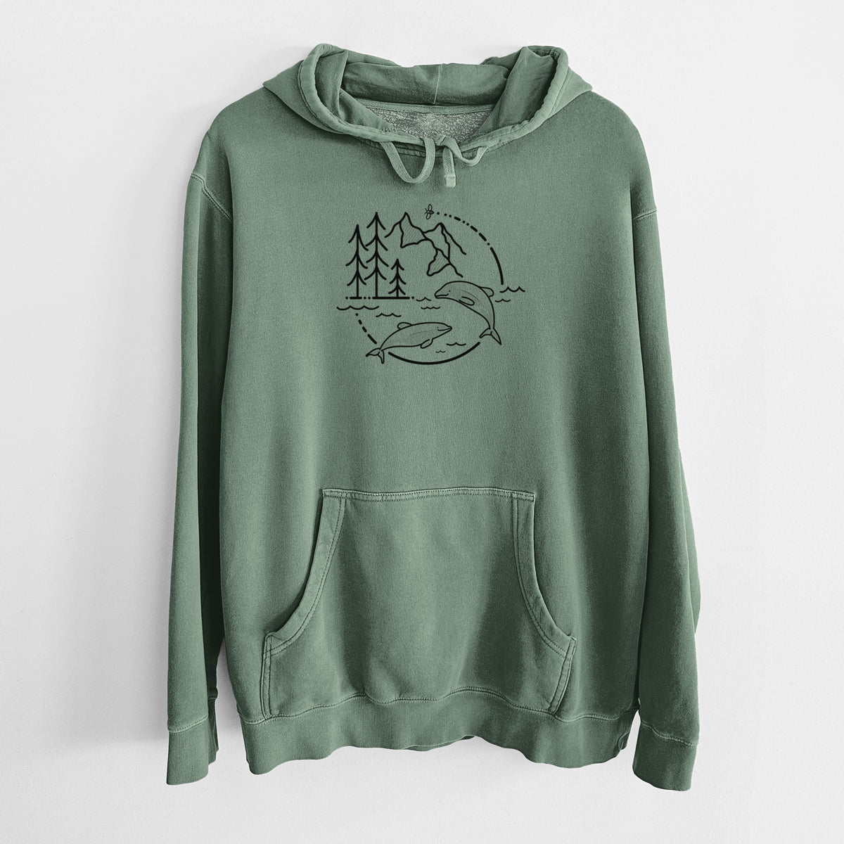 Alpine green pigment dyed hoodie laid flat, printed with a black line art circle connecting pine trees, mountains, a bee and two Maui dolphins leaping from the waves.