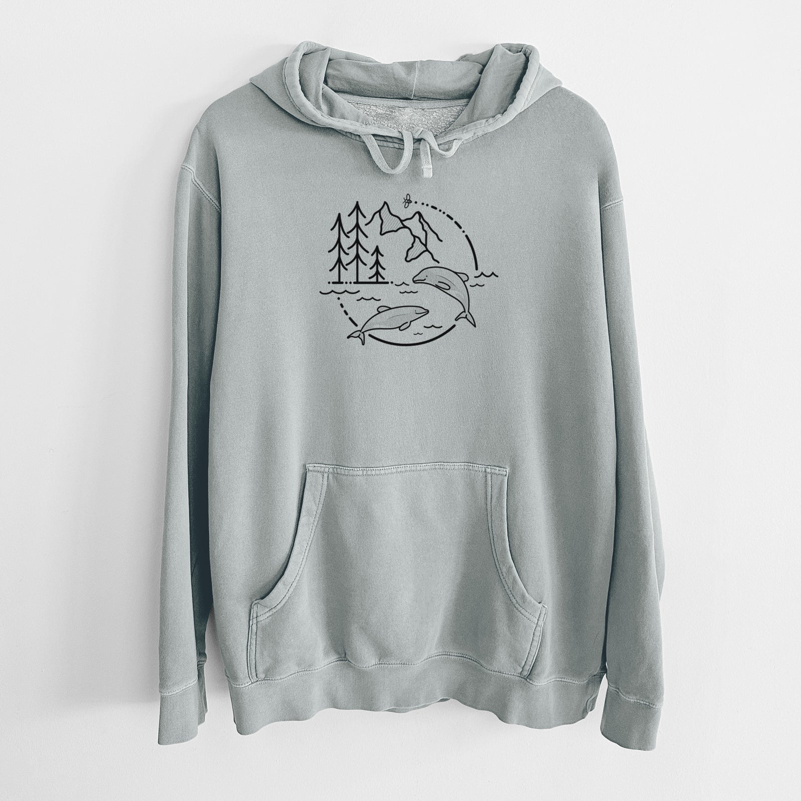 Sage green pigment dyed hoodie laid flat, printed with a black line art circle connecting pine trees, mountains, a bee and two Maui dolphins leaping from the waves.