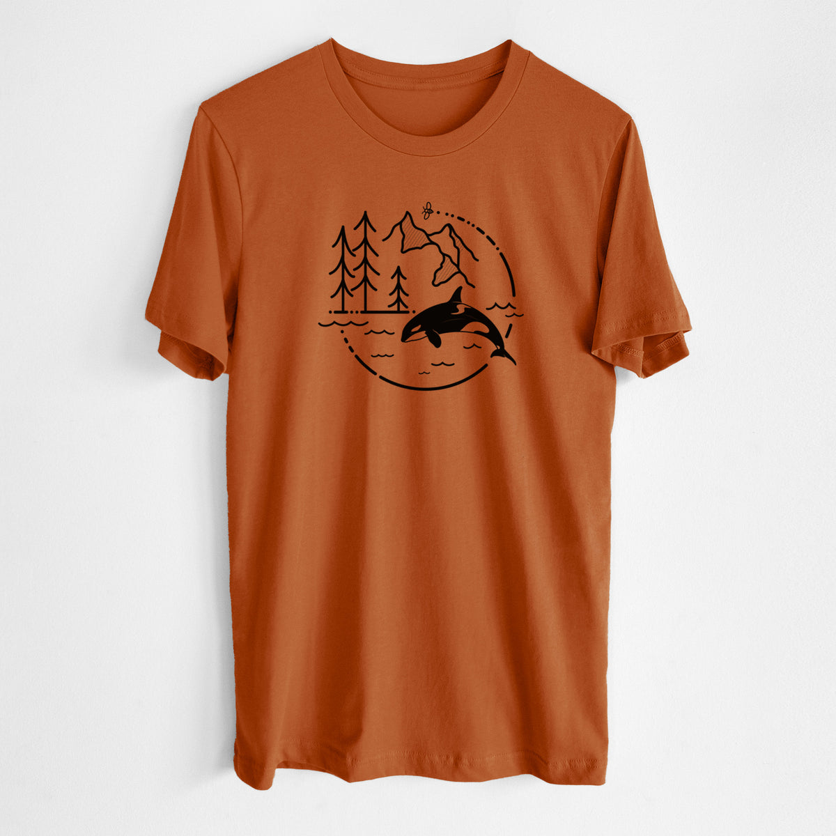 Autumn lightweight cotton t-shirt laid flat, printed with a black line art circle connecting pine trees, mountains, a bee and an orca leaping from ocean waves.