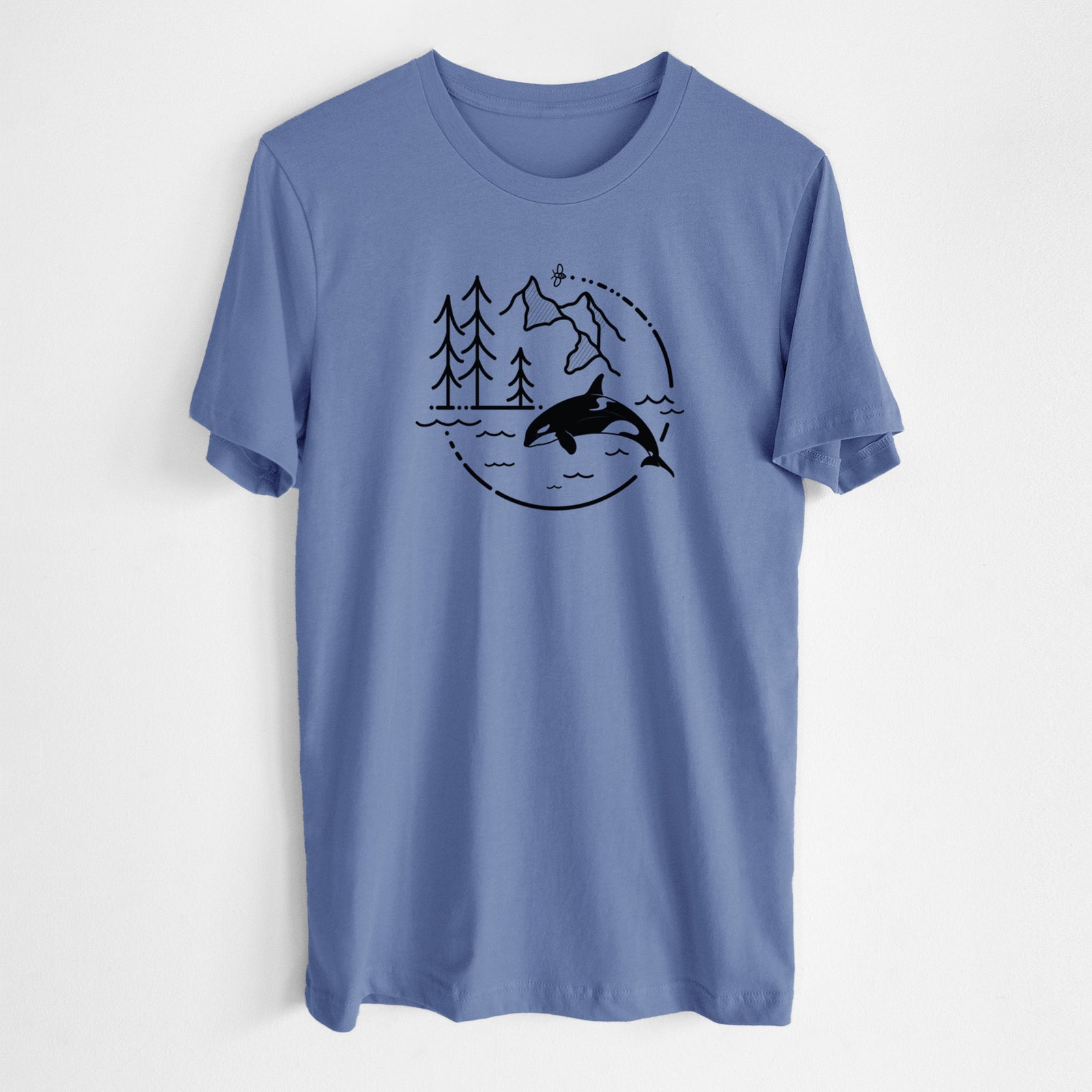 Blue bell lightweight cotton t-shirt laid flat, printed with a black line art circle connecting pine trees, mountains, a bee and an orca leaping from ocean waves.