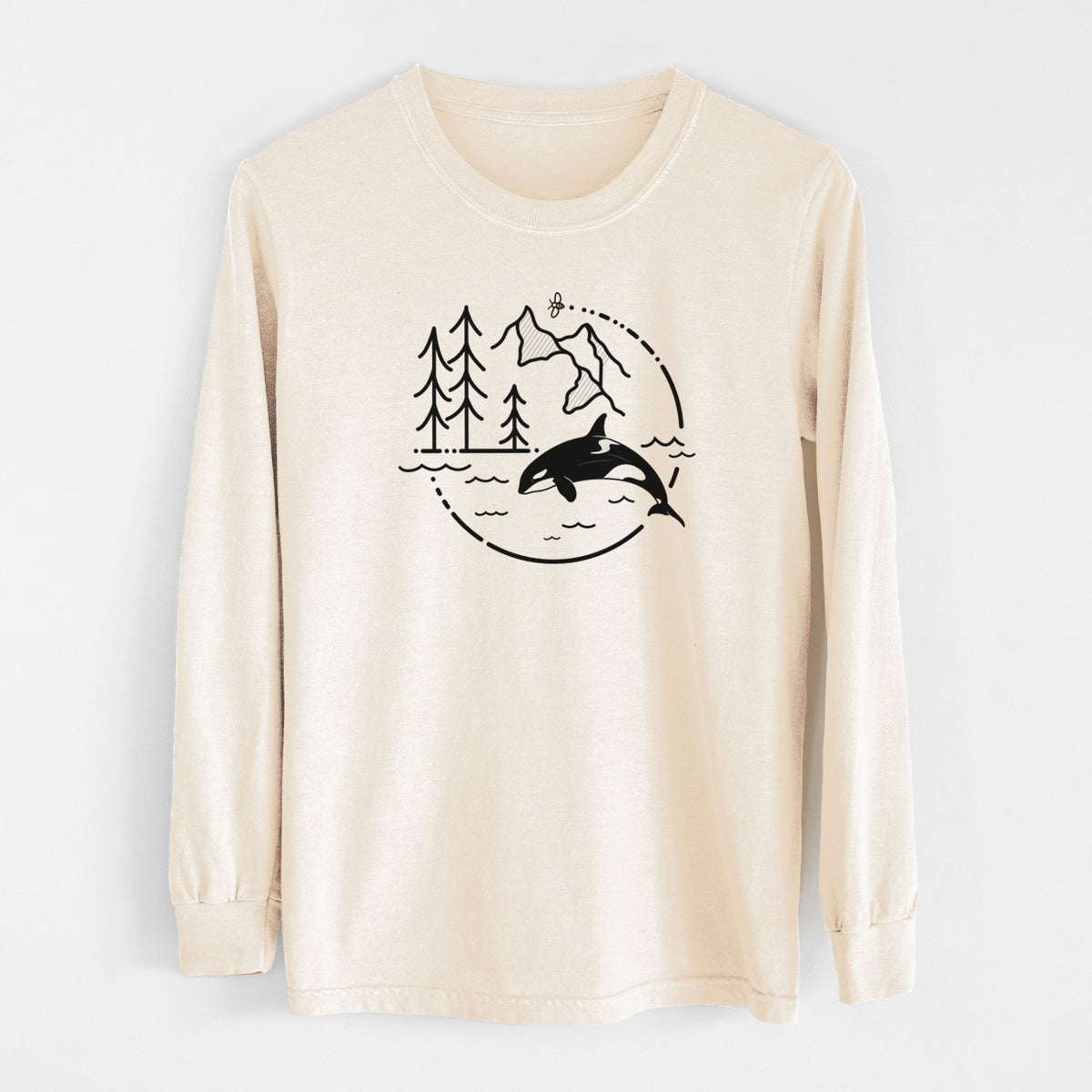 Ivory Comfort Colors long sleeve shirt laid flat, printed with a black line art circle connecting pine trees, mountains, a bee and an orca leaping from ocean waves.