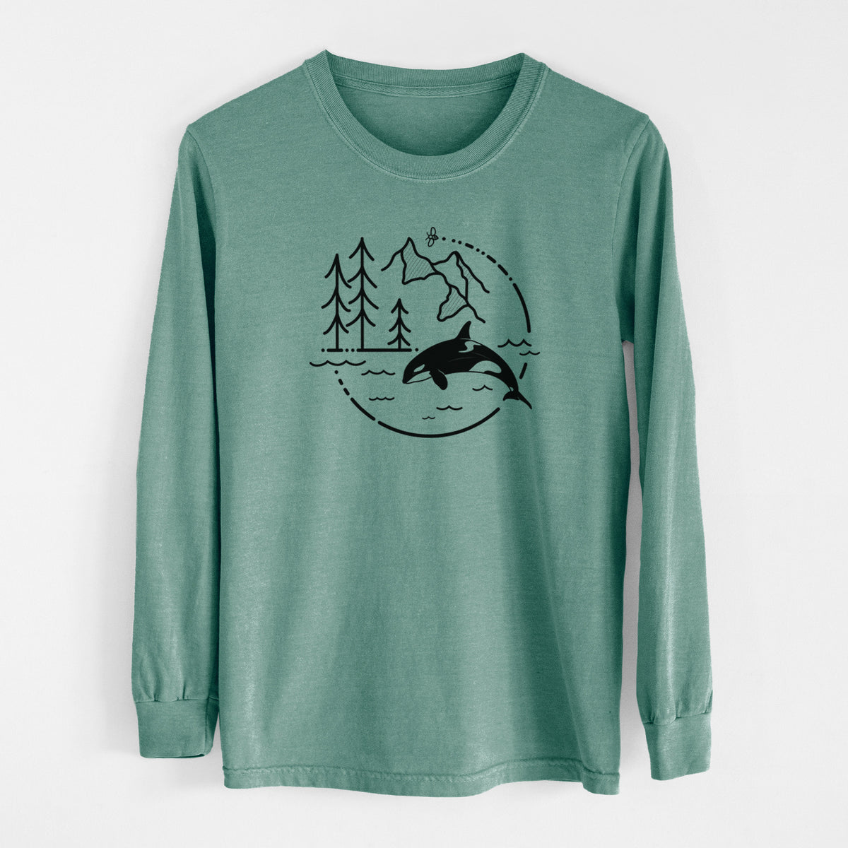 Pine green Comfort Colors long sleeve shirt laid flat, printed with a black line art circle connecting pine trees, mountains, a bee and an orca leaping from ocean waves.