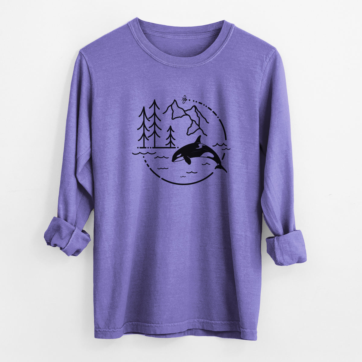 Violet purple Comfort Colors long sleeve shirt laid flat with the cuffs rolled, printed with a black line art circle connecting pine trees, mountains, a bee and an orca leaping from ocean waves.