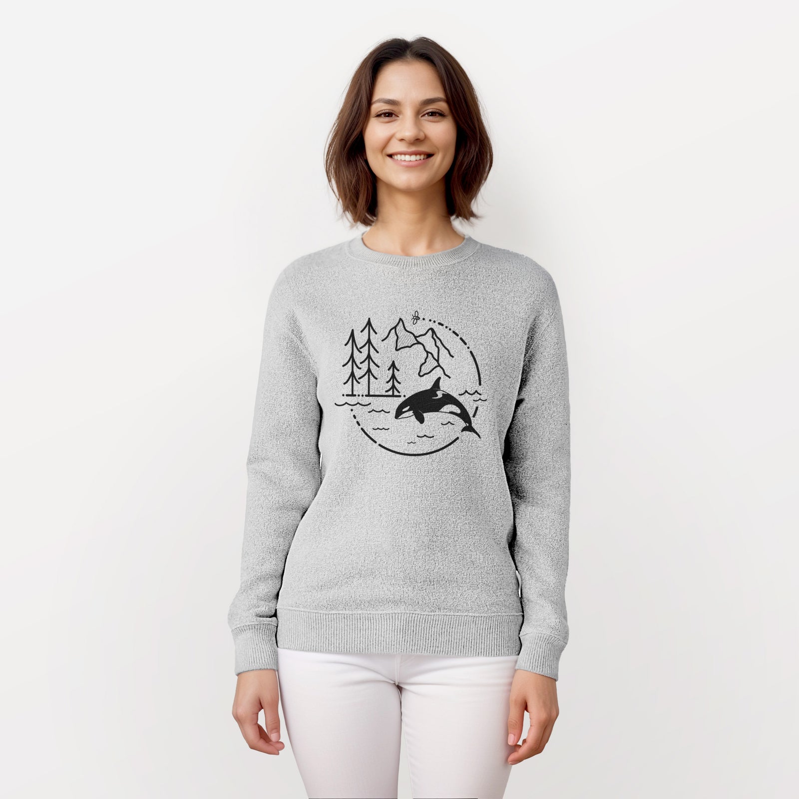 Salt and pepper knit sweatshirt laid flat, printed with a black line art circle connecting pine trees, mountains, a bee and an orca leaping from ocean waves.