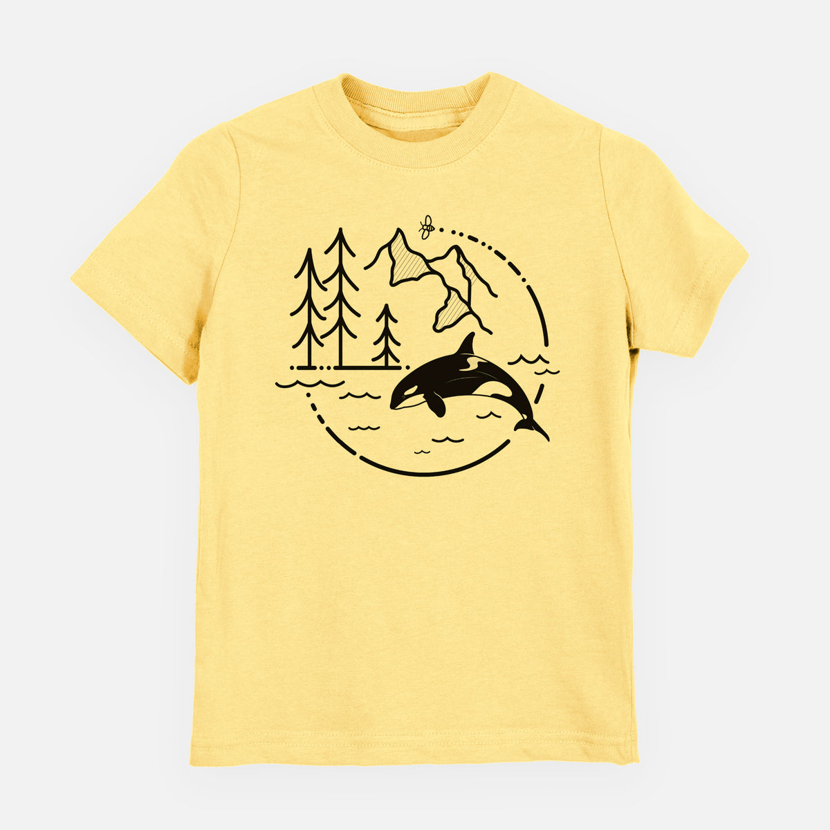 Butter yellow youth t-shirt laid flat, printed with a black line art circle connecting pine trees, mountains, a bee and an orca leaping from ocean waves.