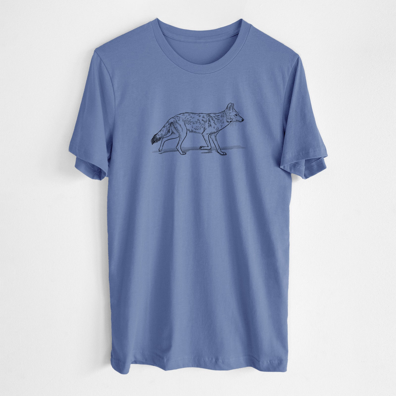 Blue bell lightweight cotton t-shirt laid flat, printed with a black ink illustration of a coyote trotting.