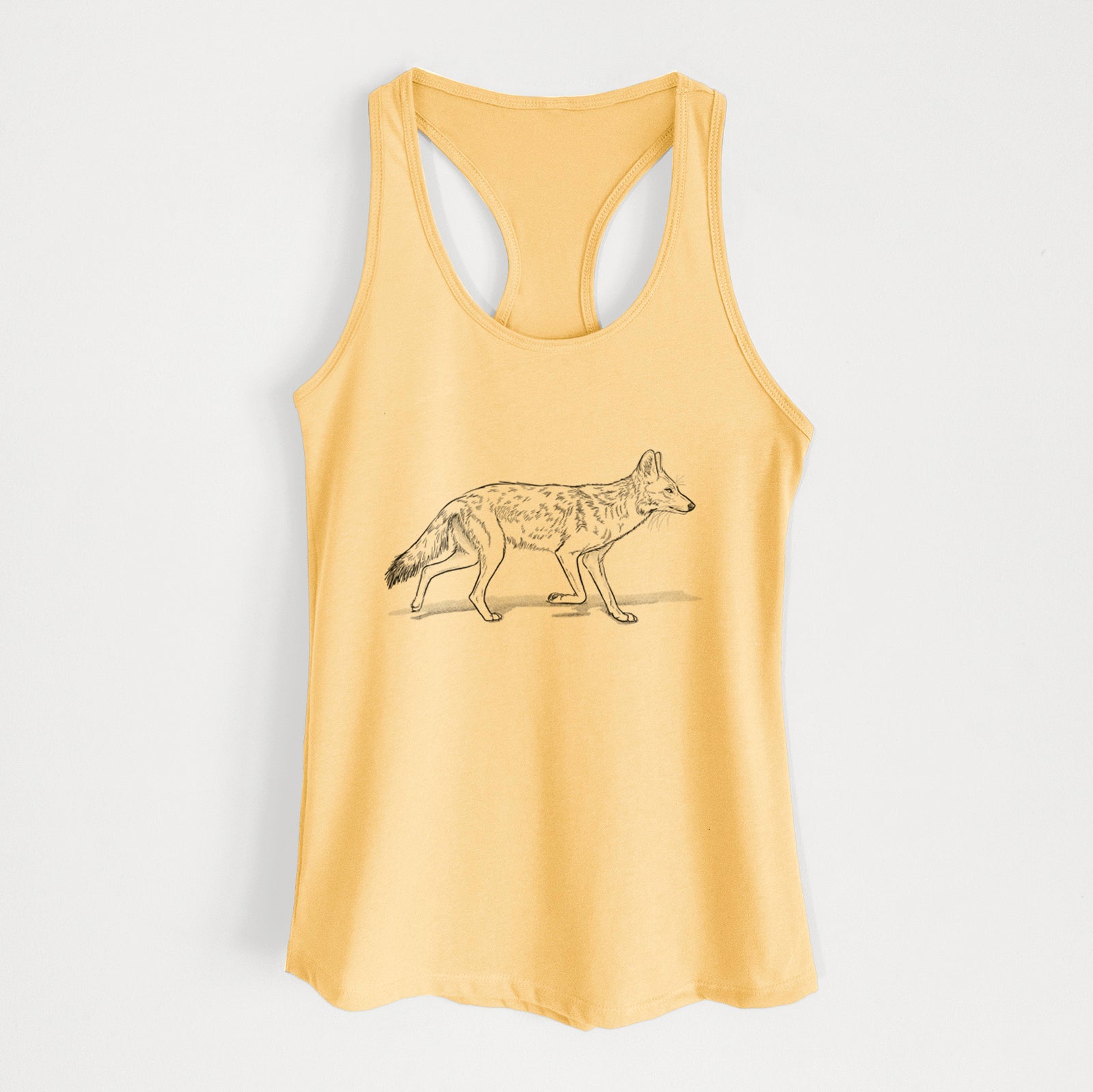 Banana cream women's racerback tank top laid flat, printed with a black ink illustration of a coyote trotting.
