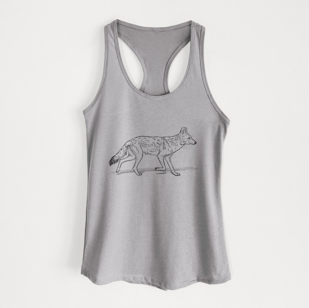 Heather grey women's racerback tank top laid flat, printed with a black ink illustration of a coyote trotting.