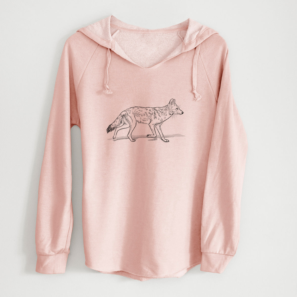 Blush pink women's Cali Wave hooded sweatshirt laid flat, printed with a black ink illustration of a coyote trotting.