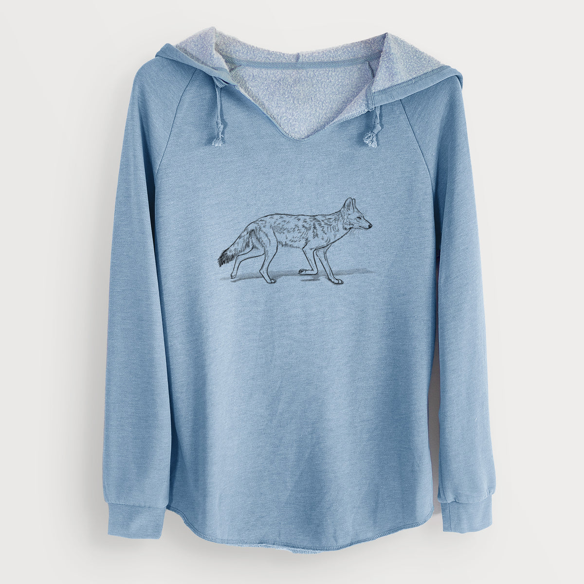 Misty blue women's Cali Wave hooded sweatshirt laid flat, printed with a black ink illustration of a coyote trotting.