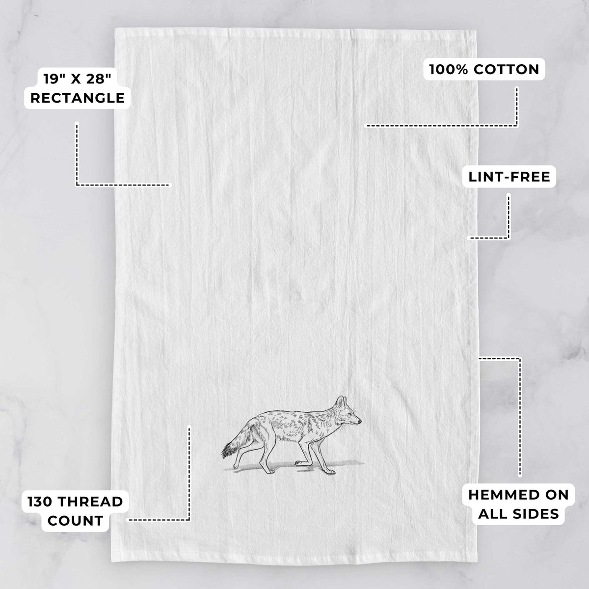 White tea towel printed with a black ink illustration of a coyote trotting, with feature labels: 19 by 28 inch rectangle, 100% cotton, lint-free, 130 thread count, hemmed on all sides.