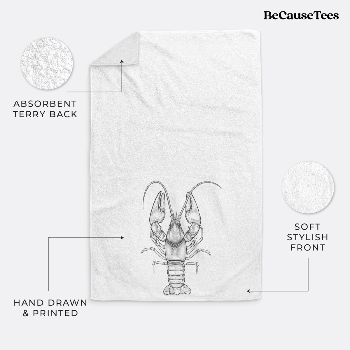 White hand towel printed with a detailed black ink illustration of a crayfish with its claws raised, seen from above.