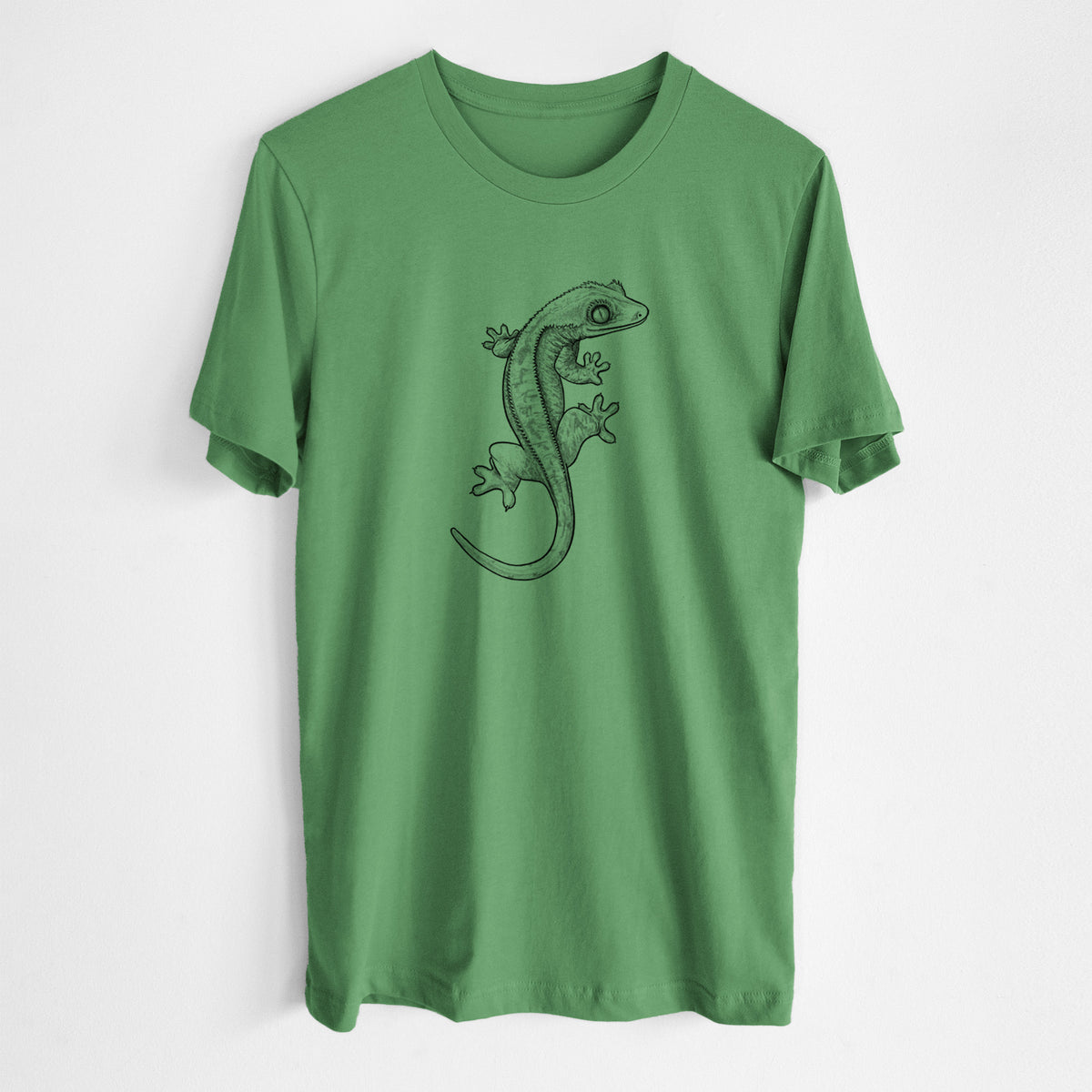 Leaf green lightweight cotton t-shirt laid flat, printed with a detailed black ink illustration of a crested gecko climbing.