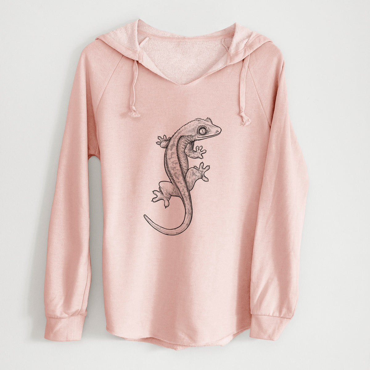 Blush pink women's Cali Wave hooded sweatshirt laid flat, printed with a detailed black ink illustration of a crested gecko climbing.