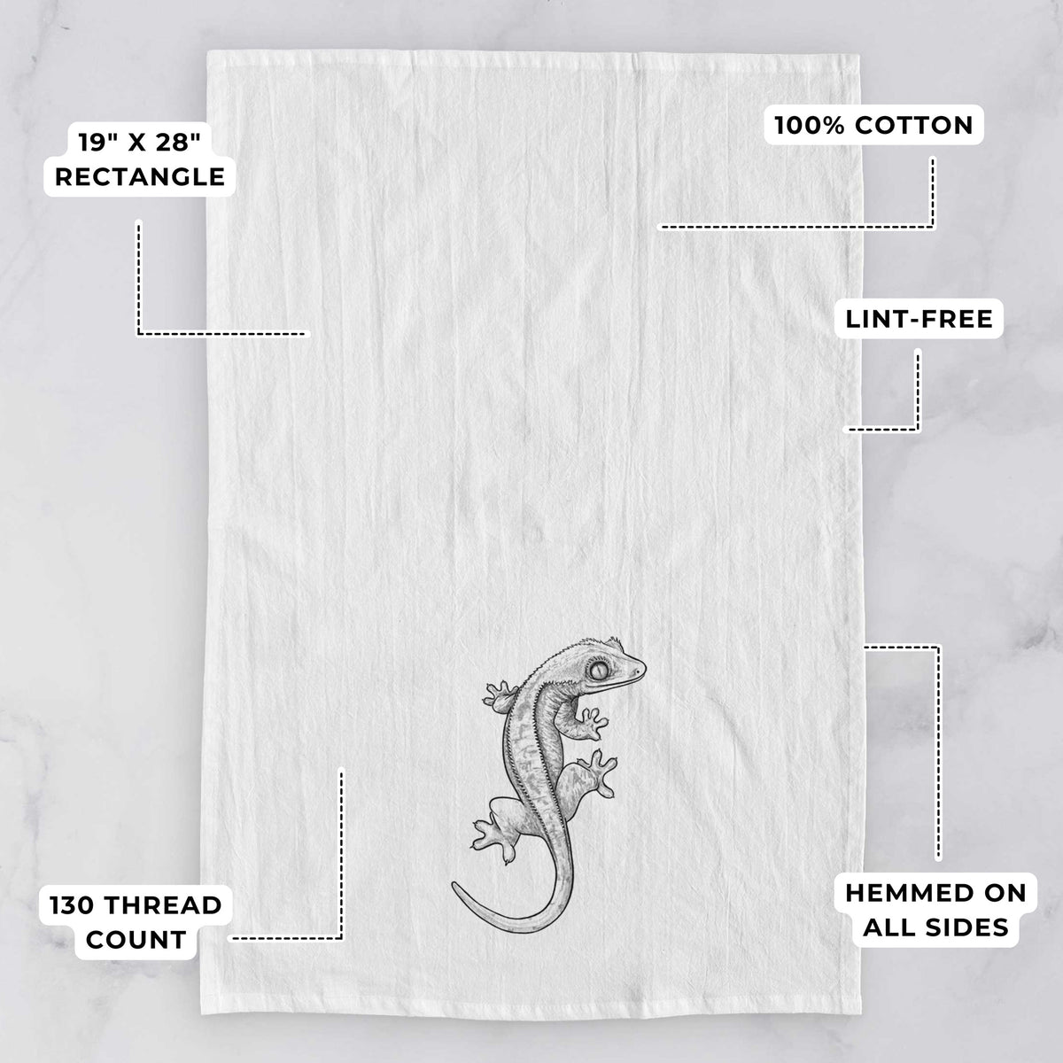 White tea towel printed with a detailed black ink illustration of a crested gecko climbing, with feature labels: 19 by 28 inch rectangle, 100% cotton, lint-free, 130 thread count, hemmed on all sides.