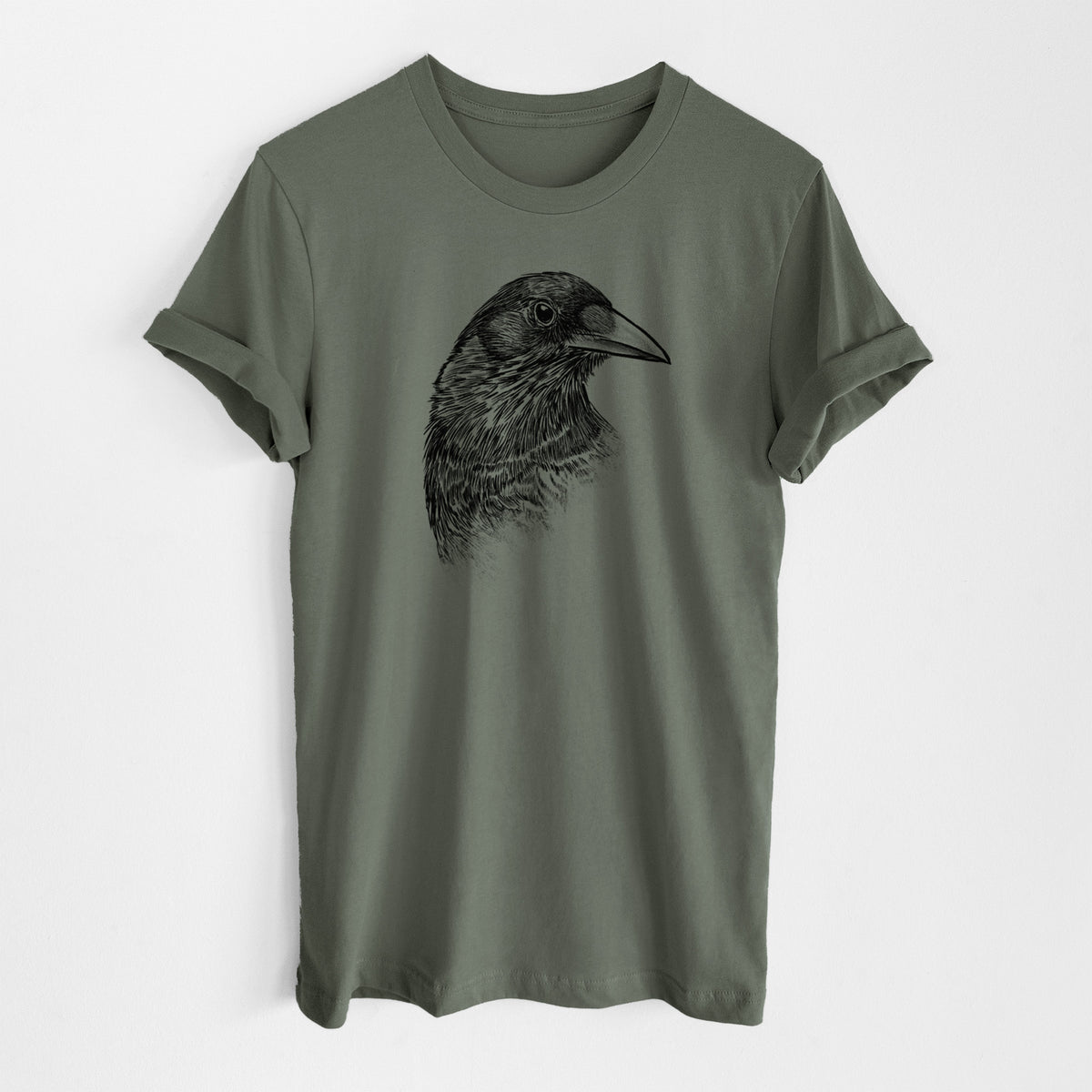 Military green lightweight cotton t-shirt laid flat, printed with a detailed black ink portrait of a crow's head in profile.