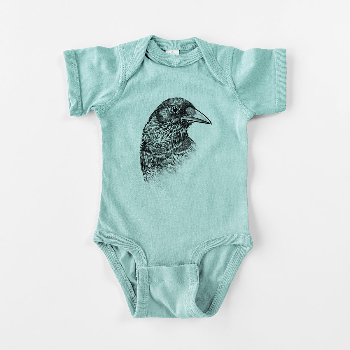 Saltwater baby bodysuit laid flat, printed with a detailed black ink portrait of a crow's head in profile.
