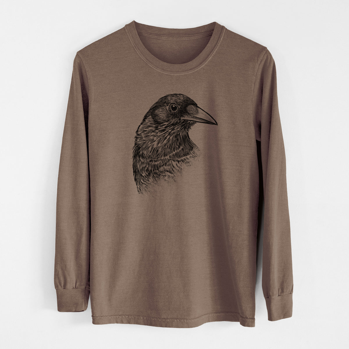 Espresso brown Comfort Colors long sleeve shirt laid flat, printed with a detailed black ink portrait of a crow's head in profile.