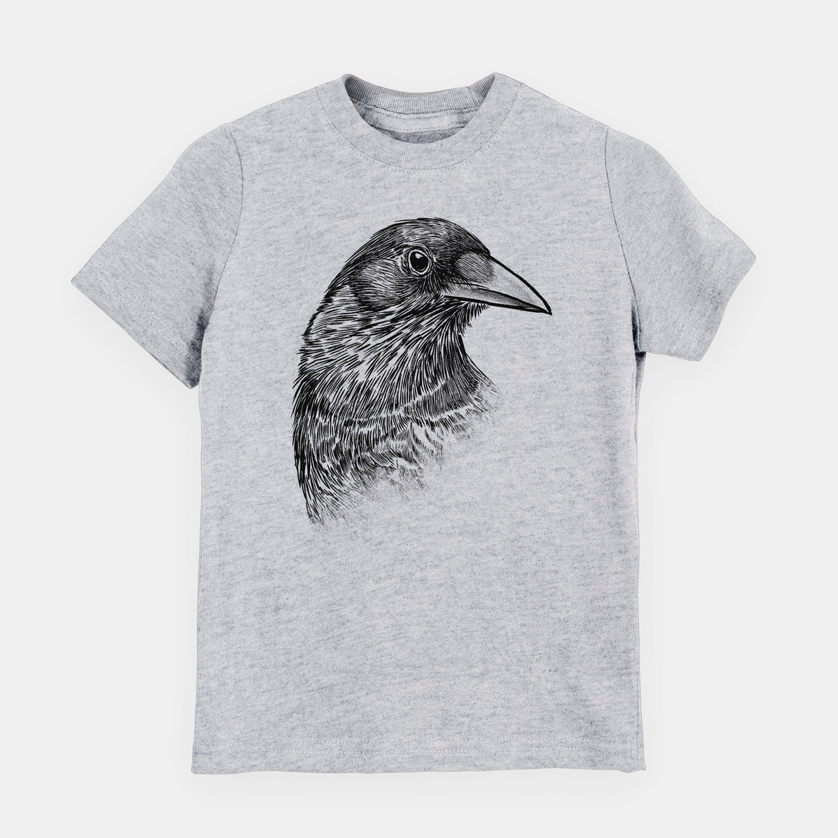 Heather grey youth t-shirt laid flat, printed with a detailed black ink portrait of a crow's head in profile.