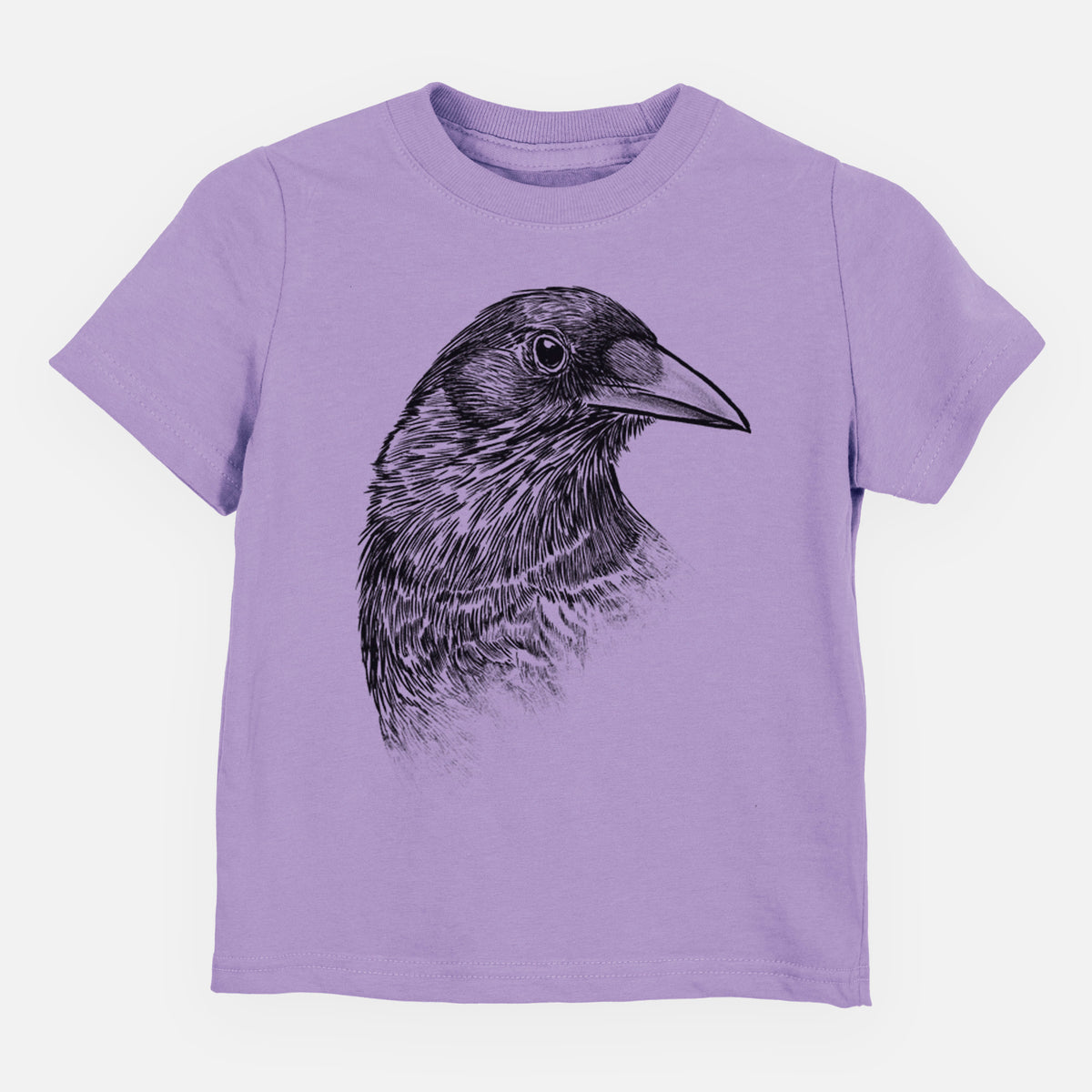 Lavender toddler t-shirt laid flat, printed with a detailed black ink portrait of a crow's head in profile.