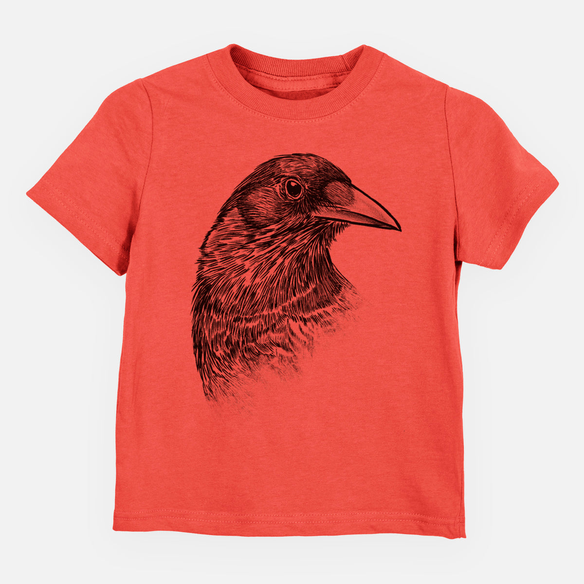 Passionfruit pink toddler t-shirt laid flat, printed with a detailed black ink portrait of a crow's head in profile.