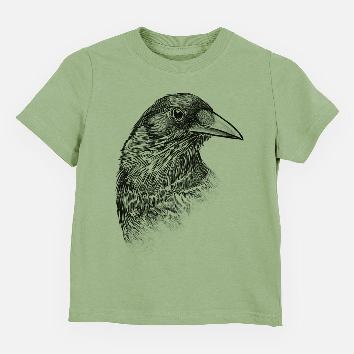 Sage green toddler t-shirt laid flat, printed with a detailed black ink portrait of a crow's head in profile.