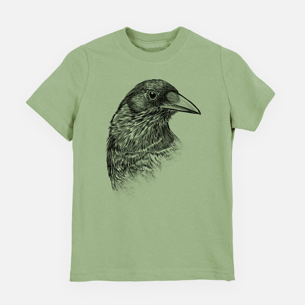 Sage green youth t-shirt laid flat, printed with a detailed black ink portrait of a crow's head in profile.