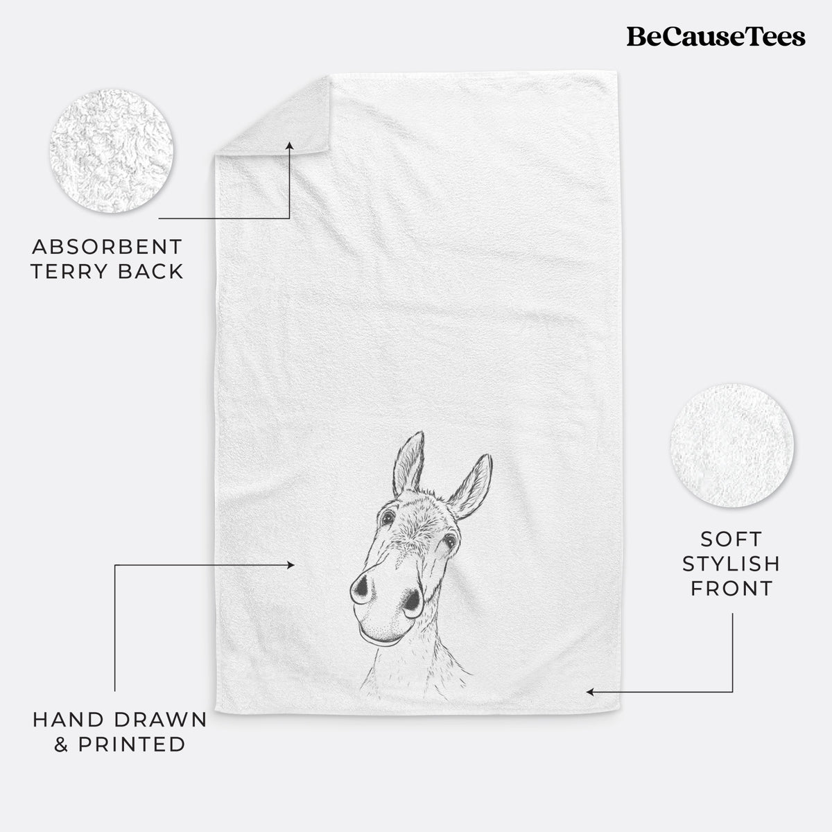 White hand towel printed with a black ink illustration of a curious donkey's head with tall ears.