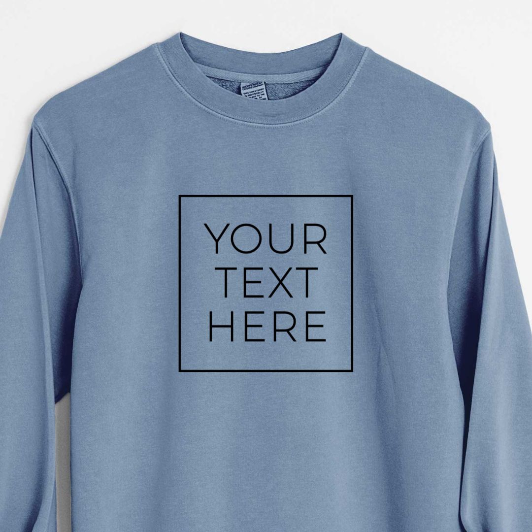 Slate blue pigment dyed crewneck sweatshirt printed with your own custom text in black letters inside a square outline.