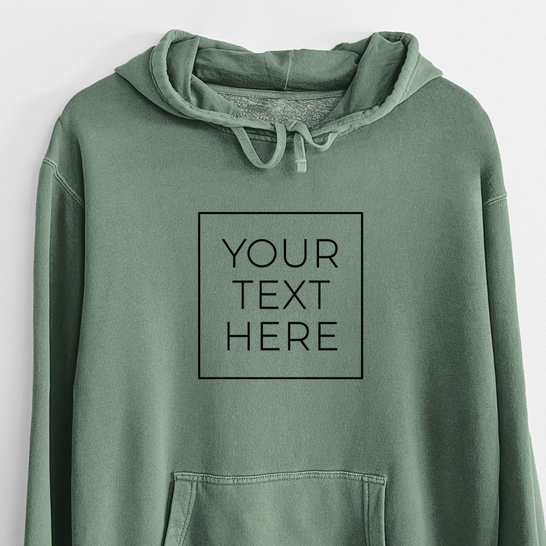 Pigment dyed hoodie printed with your own custom text in black letters inside a square outline.