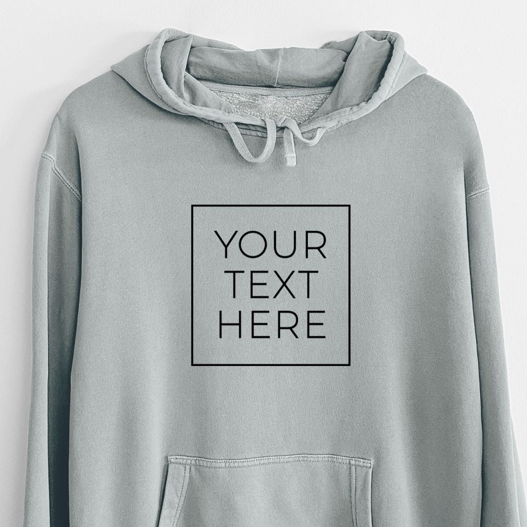 Pigment dyed hoodie printed with your own custom text in black letters inside a square outline.