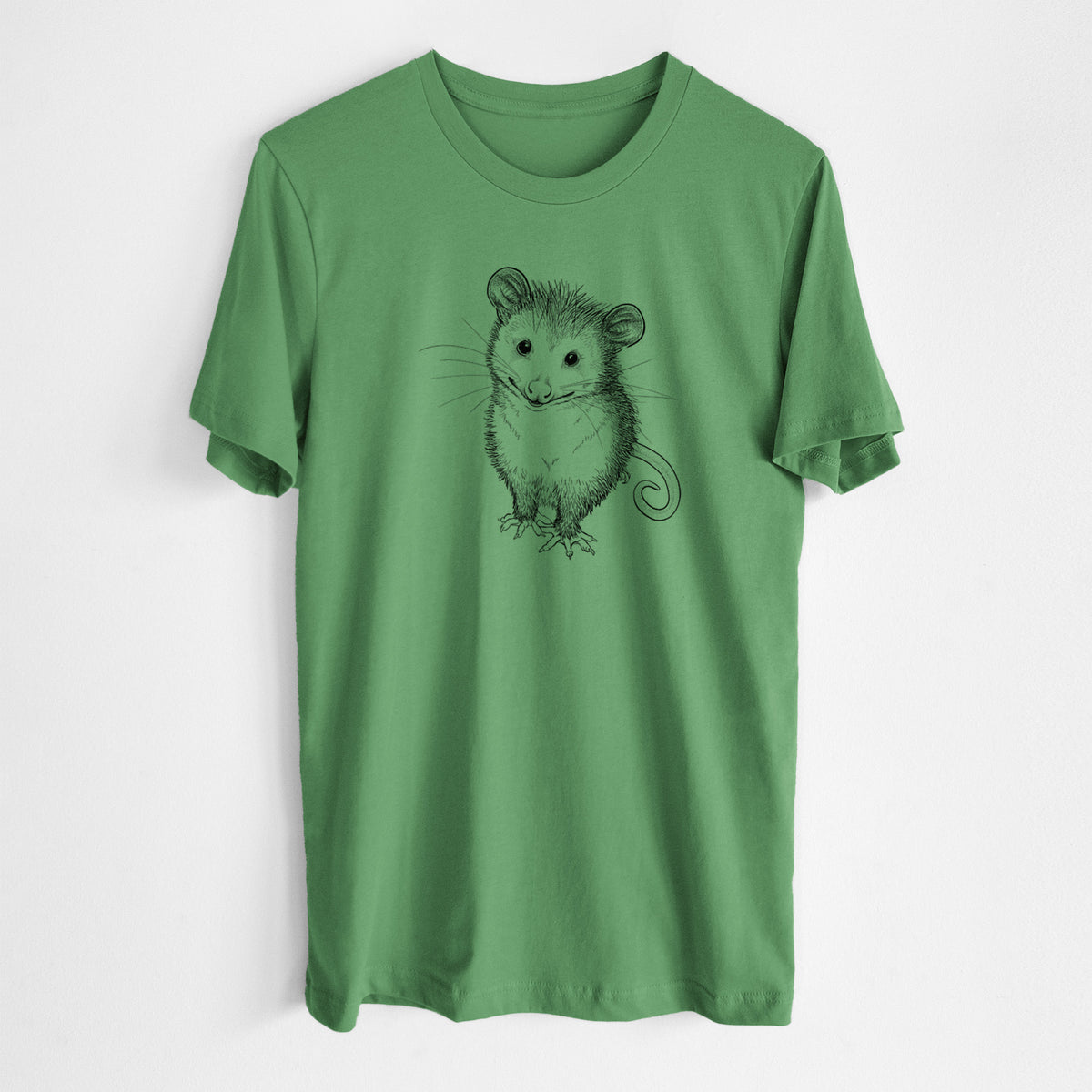 Leaf green lightweight cotton t-shirt laid flat, printed with a black ink illustration of a wide-eyed baby opossum sitting.
