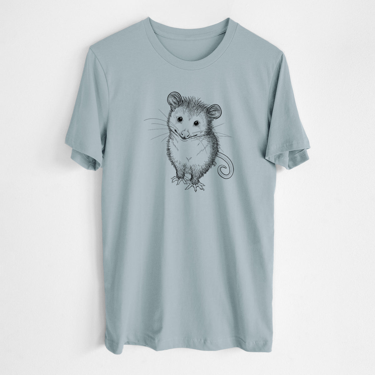 Vintage denim lightweight cotton t-shirt laid flat, printed with a black ink illustration of a wide-eyed baby opossum sitting.