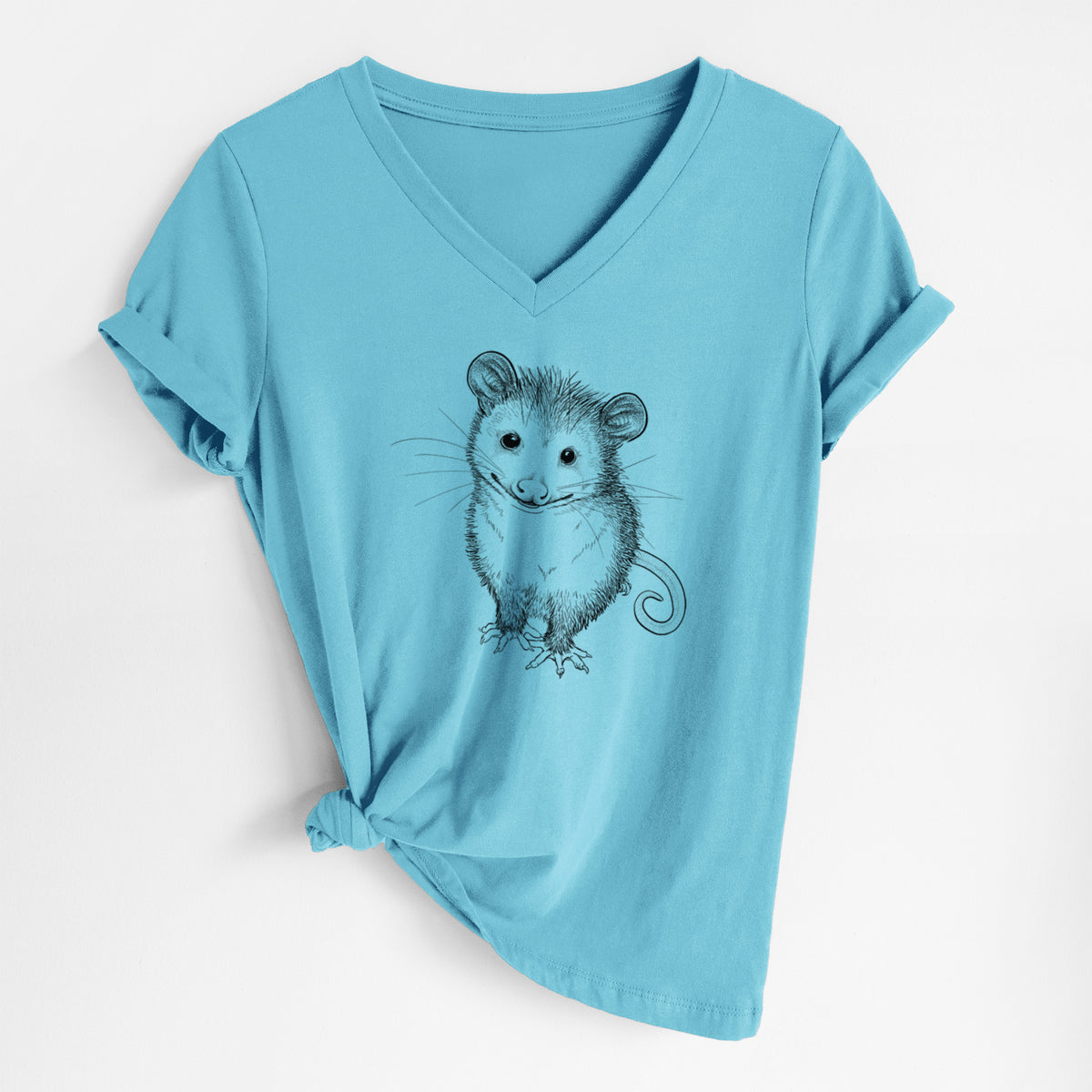 Turquoise women's relaxed fit cotton V-neck t-shirt laid flat, printed with a black ink illustration of a wide-eyed baby opossum sitting.