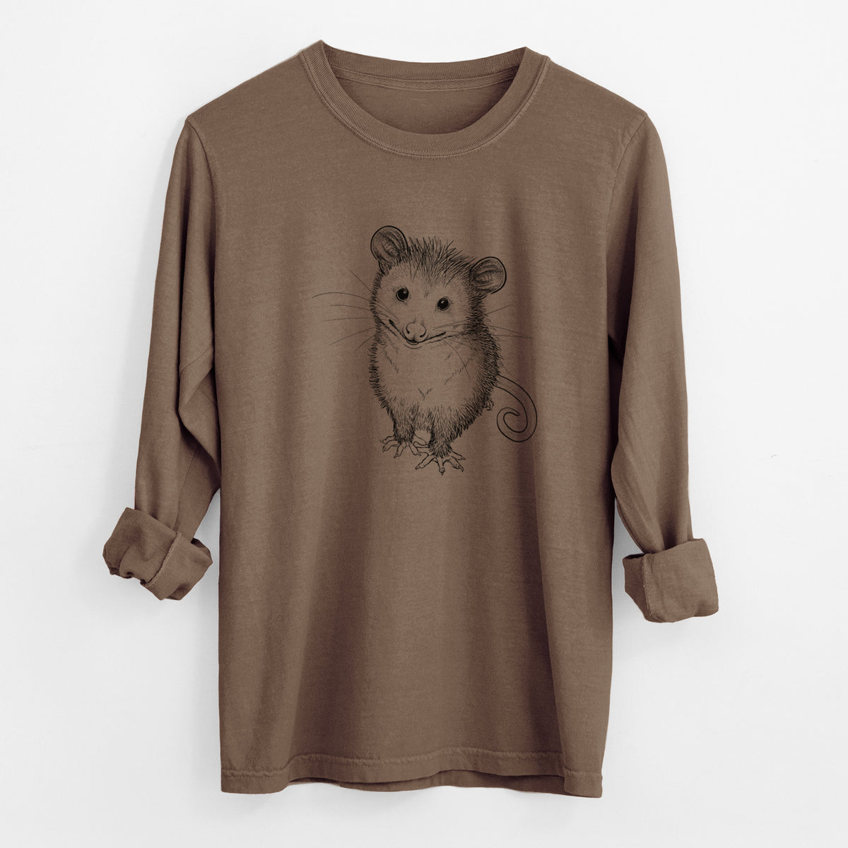 Espresso brown Comfort Colors long sleeve shirt laid flat with the cuffs rolled, printed with a black ink illustration of a wide-eyed baby opossum sitting.