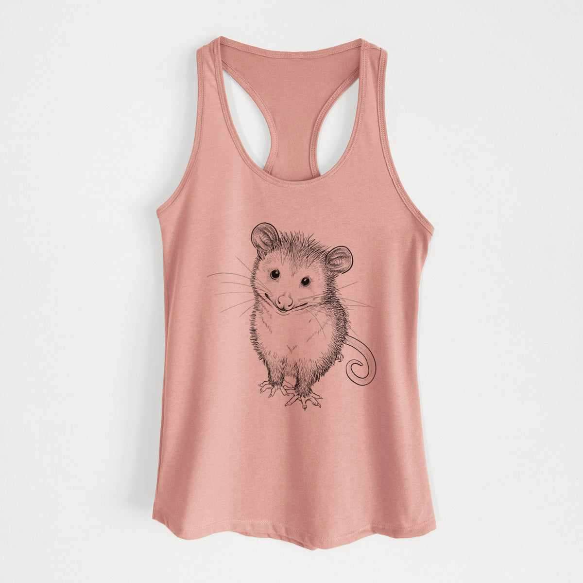 Desert pink women's racerback tank top laid flat, printed with a black ink illustration of a wide-eyed baby opossum sitting.