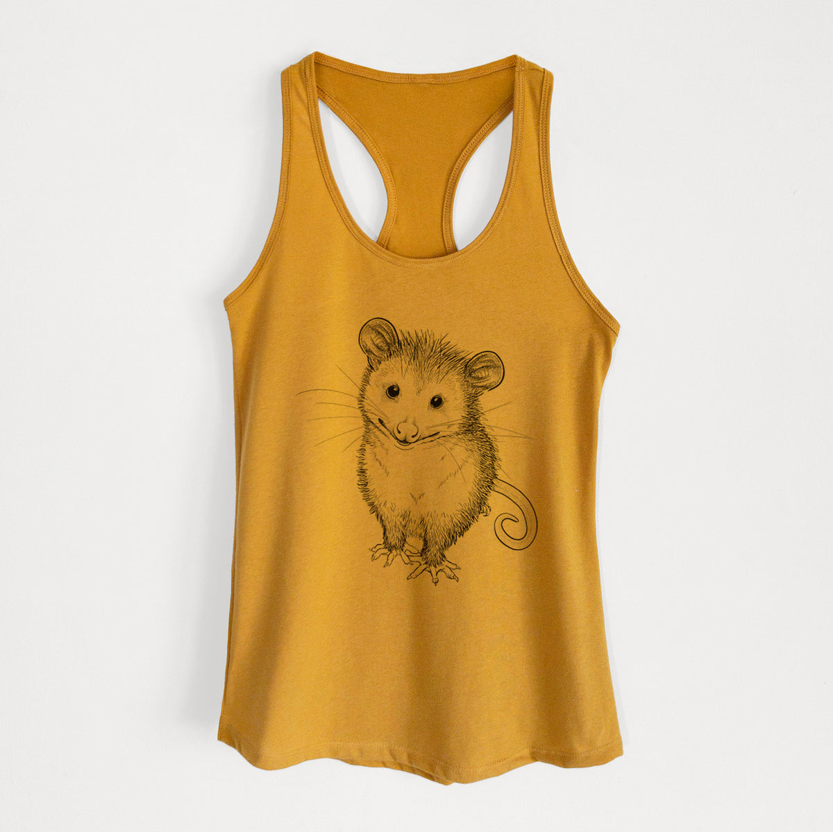 Gold women's racerback tank top laid flat, printed with a black ink illustration of a wide-eyed baby opossum sitting.