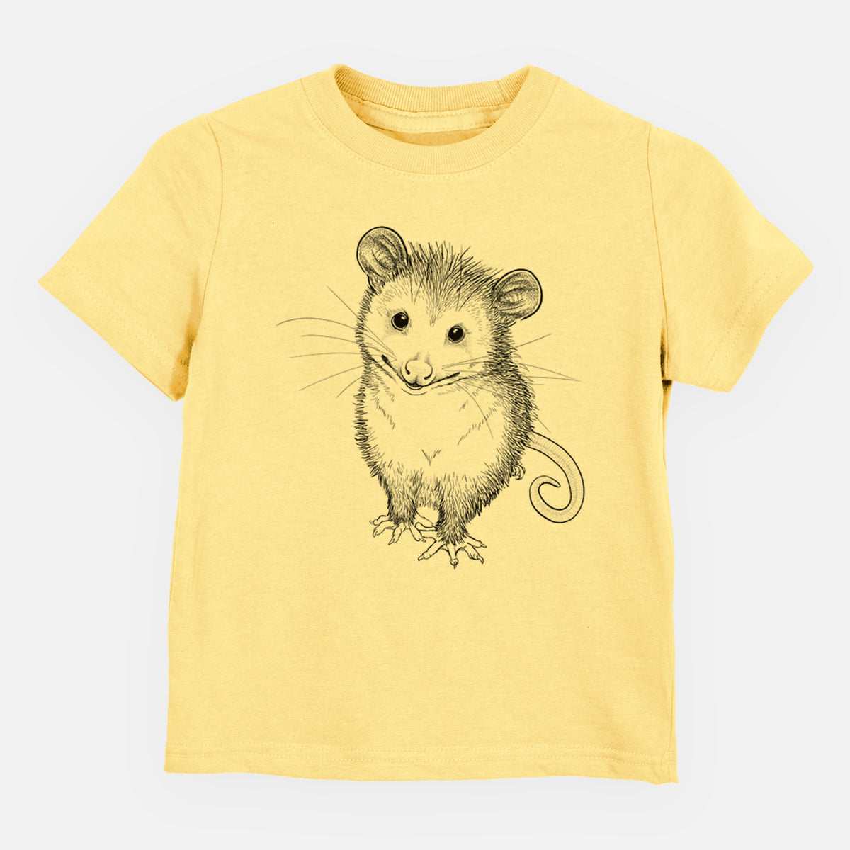 Butter yellow toddler t-shirt laid flat, printed with a black ink illustration of a wide-eyed baby opossum sitting.