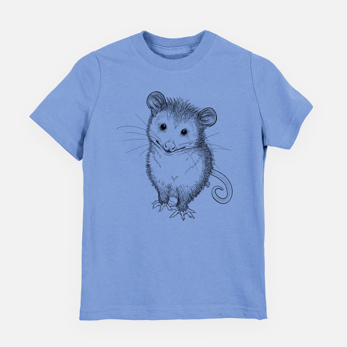 Carolina blue youth t-shirt laid flat, printed with a black ink illustration of a wide-eyed baby opossum sitting.